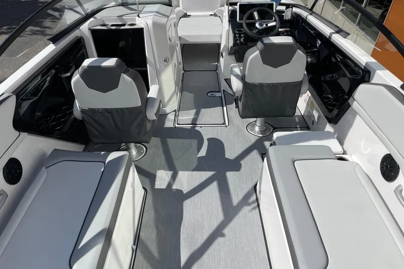 Slide: The Image of 2025 Yamaha Boats AR250 interior with modern seating and sleek design. - 5