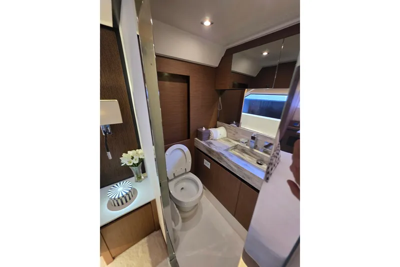 Slide: The Image of Luxurious bathroom interior of 2022 Prestige X70 yacht with modern fixtures and elegant design. - 15