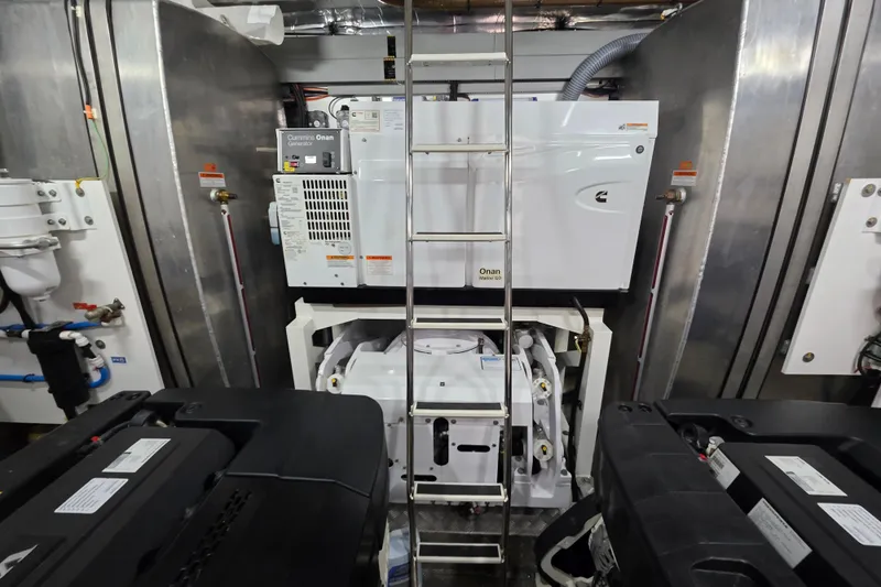 Slide: The Image of Engine room of 2022 Prestige X70 yacht with Cummins Onan generator and equipment. - 25