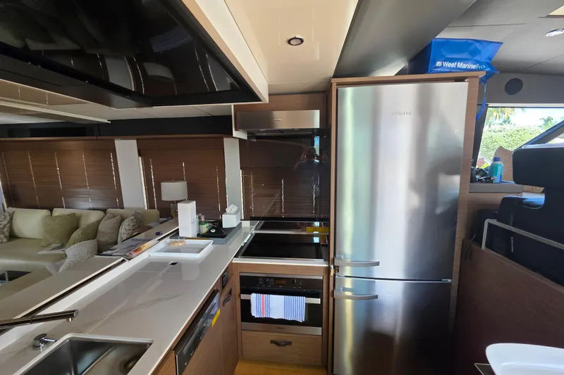 Slide: The Image of Luxurious kitchen interior of 2022 Prestige X70 yacht with modern appliances. - 3