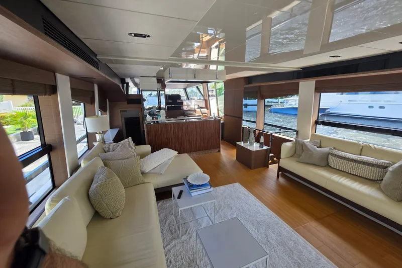 Slide: The Image of Luxurious interior of 2022 Prestige X70 yacht with elegant seating and modern decor. - 8