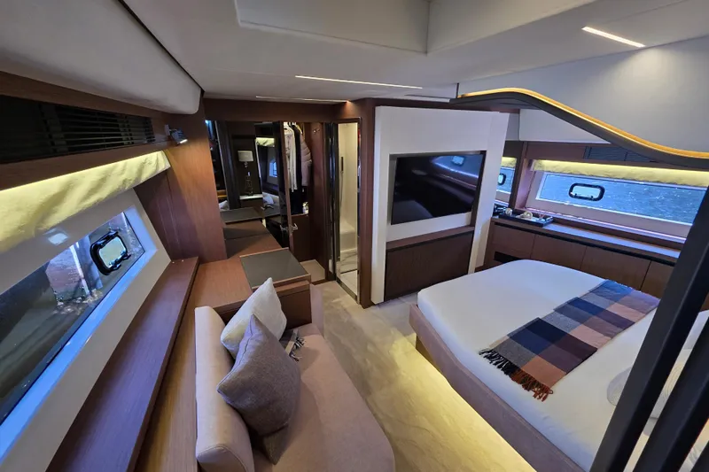 Slide: The Image of Luxurious interior of 2022 Prestige X70 yacht with modern bedroom design. - 9