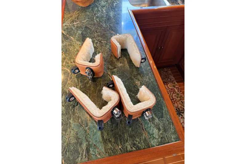 Slide: The Image of Sheepskin-lined boat chocks on a marble counter, Fleming 55, 2007 model. - 102