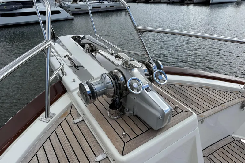 Slide: The Image of Bow of 2007 Fleming 55 yacht with anchor windlass and teak decking. - 21