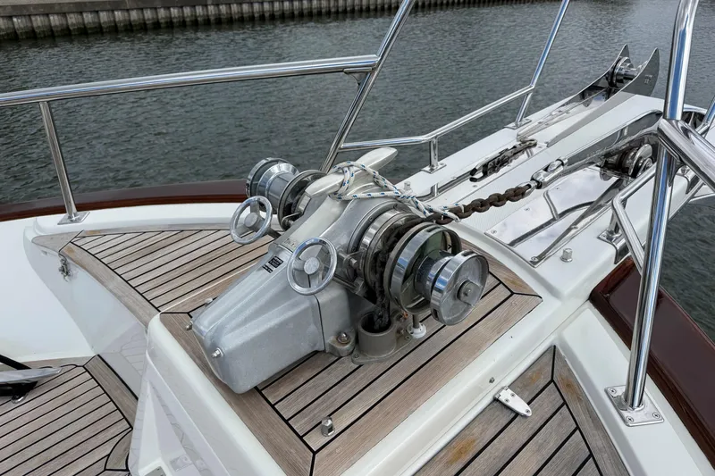 Slide: The Image of Anchor winch on 2007 Fleming 55 yacht with teak deck and stainless steel fittings. - 22