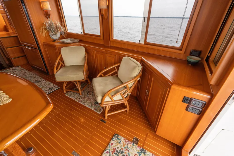 Slide: The Image of Luxurious 2007 Fleming 55 yacht interior with wooden furnishings and ocean view. - 35