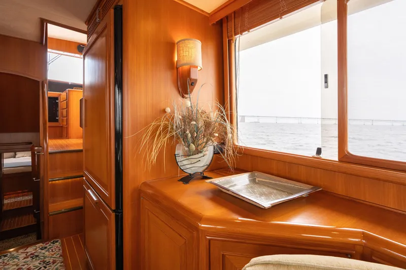 Slide: The Image of Luxurious interior of 2007 Fleming 55 yacht with wooden cabinetry and ocean view. - 39