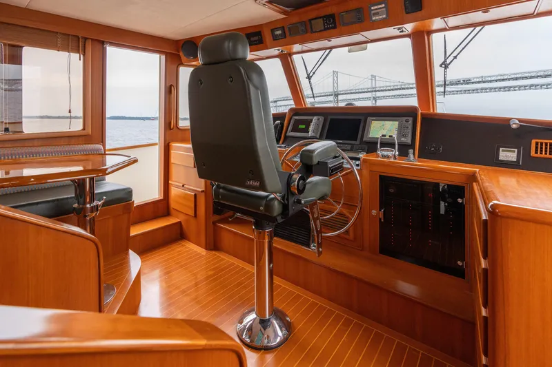 Slide: The Image of Cozy cabin interior of 2007 Fleming 55 yacht with bunk beds and wooden wardrobe. - 61