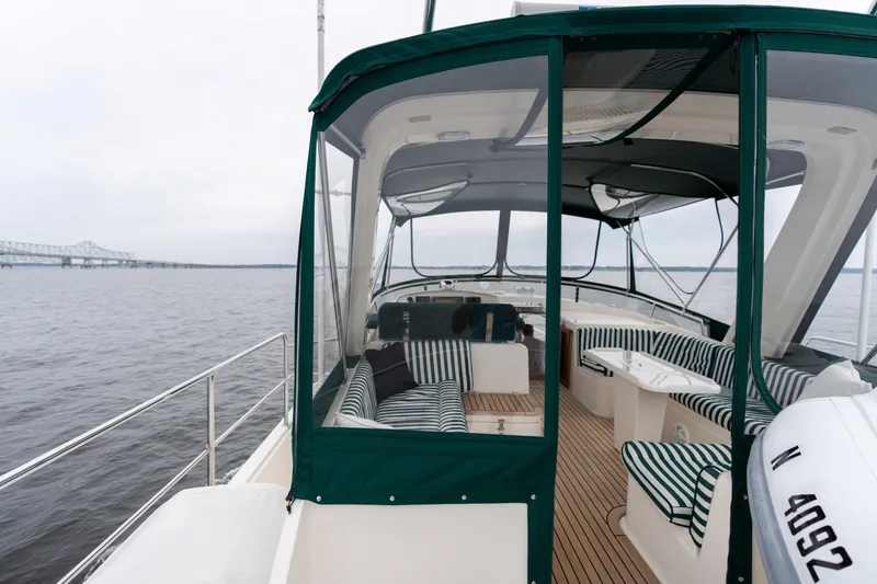 Slide: The Image of Radar and antenna equipment on a 2007 Fleming 55 yacht under cloudy skies. - 83