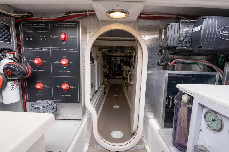 Slide: The Image of Engine room of 2007 Fleming 55 yacht with control panels and equipment. - 87