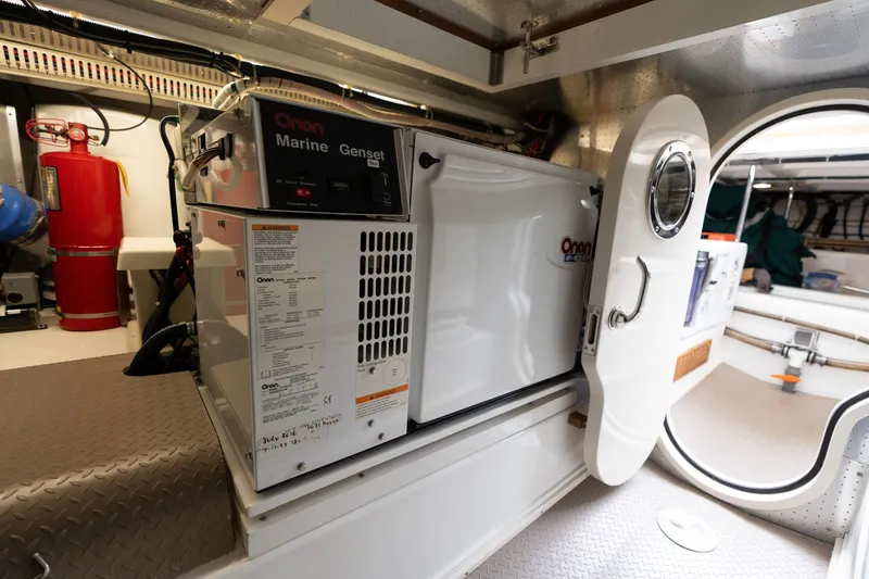 Slide: The Image of Onan Marine Genset in 2007 Fleming 55 yacht engine room. - 91