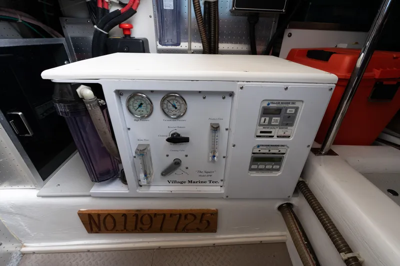 Slide: The Image of Onan generator in the engine room of a 2007 Fleming 55 yacht. - 92