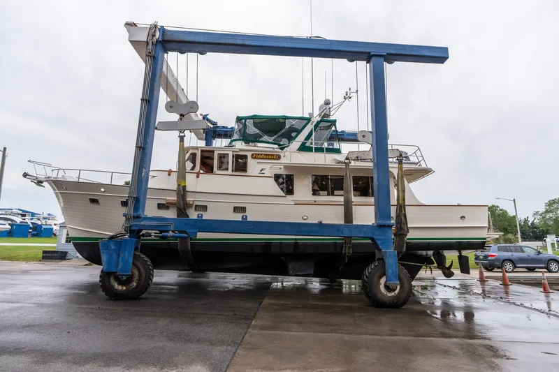 Slide: The Image of Engine room of a 2007 Fleming 55 yacht with organized tools and equipment. - 94