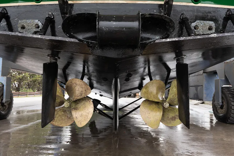 Slide: The Image of 2007 Fleming 55 yacht on a boat lift at a marina, overcast day. - 95