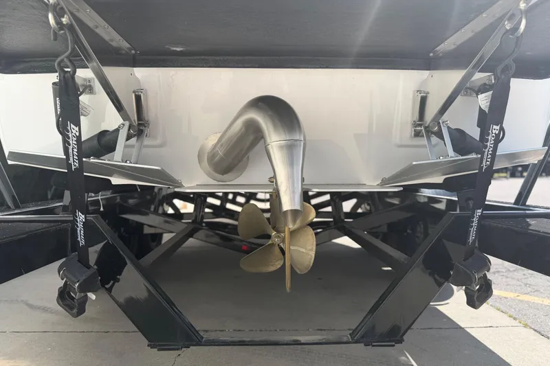 Slide: The Image of Rear view of 2025 Moomba Tykon boat showing propeller and exhaust system. - 11