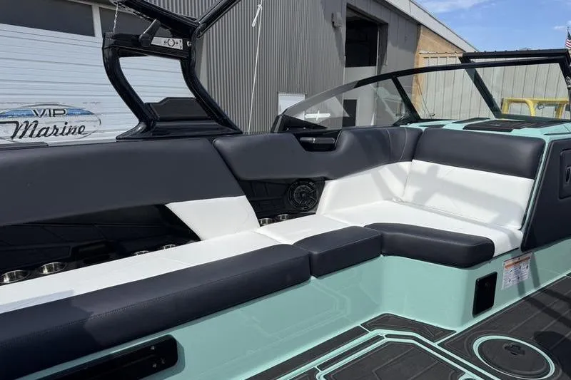 Slide: The Image of 2025 Moomba Tykon boat interior with sleek seating and modern design. - 7