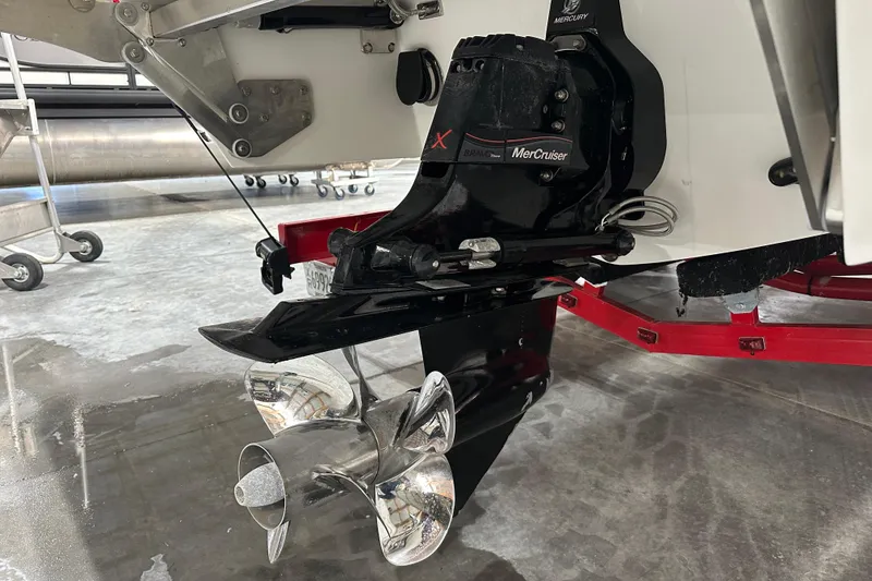 Slide: The Image of 2012 Cobalt A25 boat with MerCruiser outdrive and stainless steel propeller. - 19