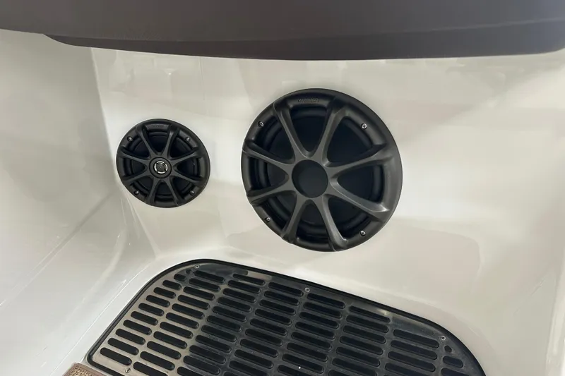 Slide: The Image of Speakers installed in a 2012 Cobalt A25 boat interior. - 23