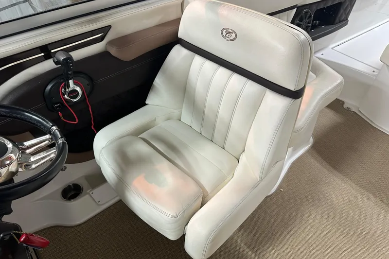 Slide: The Image of Luxurious white leather seat in 2012 Cobalt A25 boat interior. - 26