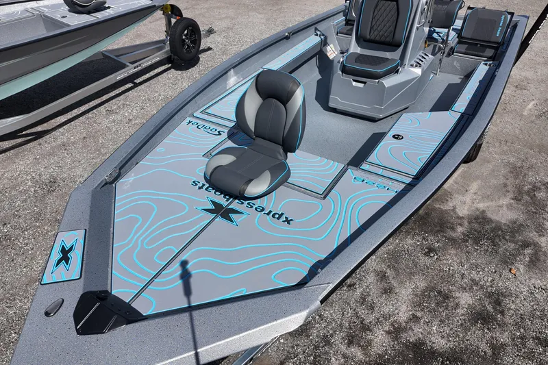 Slide: The Image of 2026 Xpress H22B Bay boat with sleek design and modern seating on display. - 14