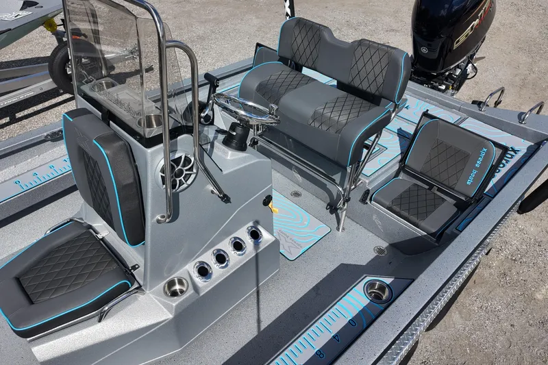 Slide: The Image of 2026 Xpress H22B Bay boat interior with modern seating and control console. - 16