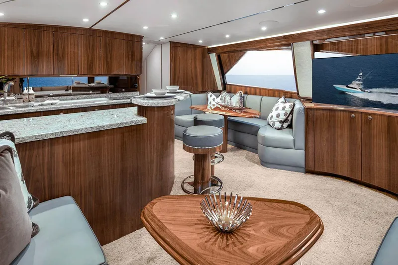 Slide: The Image of Luxurious interior of 2026 Viking 58 Convertible yacht with elegant wood finishes and ocean view. - 18