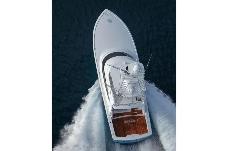 Slide: The Image of Aerial view of 2026 Viking 58 Convertible yacht cruising on the ocean. - 8