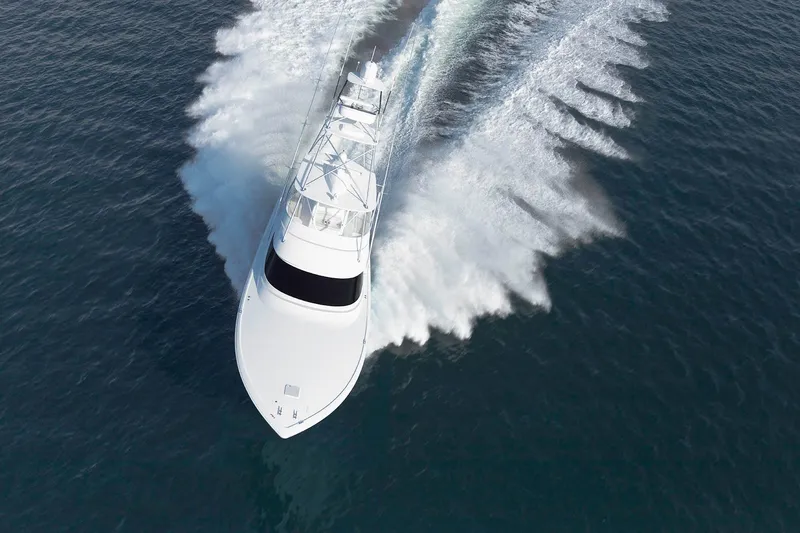 Slide: The Image of Aerial view of 2026 Viking 58 Convertible yacht cruising on open water. - 9