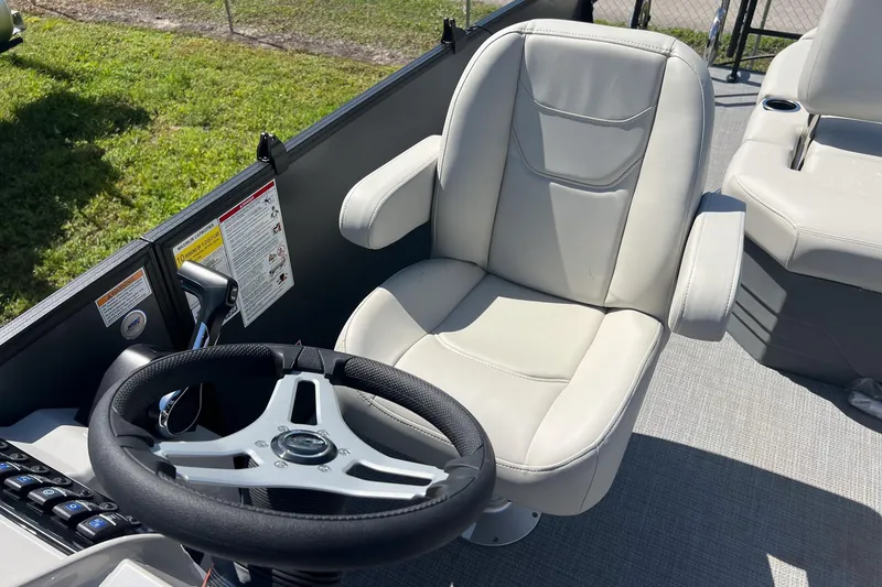 Slide: The Image of Captain's chair and steering wheel on 2026 Sylvan Mirage 820 CLZ DH boat. - 10