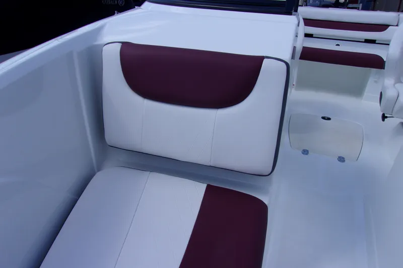Slide: The Image of 2019 Tahoe 500 TF boat interior with white and maroon seating. - 10