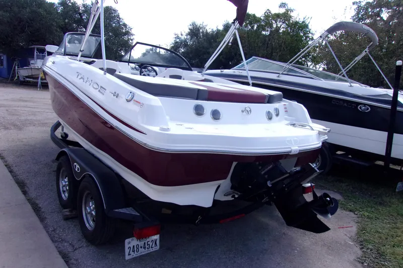 Slide: The Image of 2019 Tahoe 500 TF boat on trailer, parked outdoors, rear view. - 4