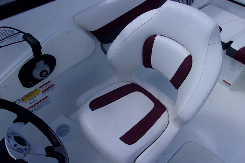 Slide: The Image of White and maroon boat seat in 2019 Tahoe 500 TF model. - 7