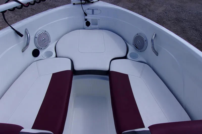 Slide: The Image of Interior of 2019 Tahoe 500 TF boat with maroon and white seating. - 9