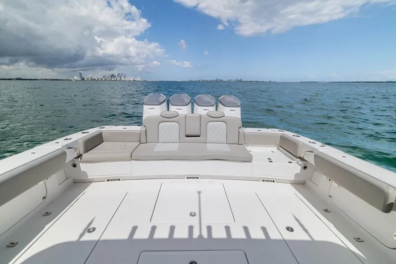 Slide: The Image of 2023 HCB 53 Sueños boat deck with ocean view and city skyline. - 29