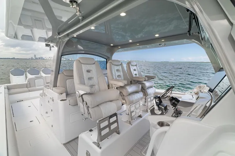 Slide: The Image of Luxurious interior of 2023 HCB 53 Sueños boat with plush seating and modern controls. - 42