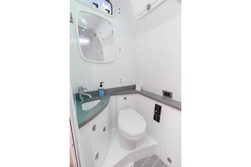 Slide: The Image of Modern bathroom in 2023 HCB 53 Sueños boat, featuring sleek design and compact amenities. - 59