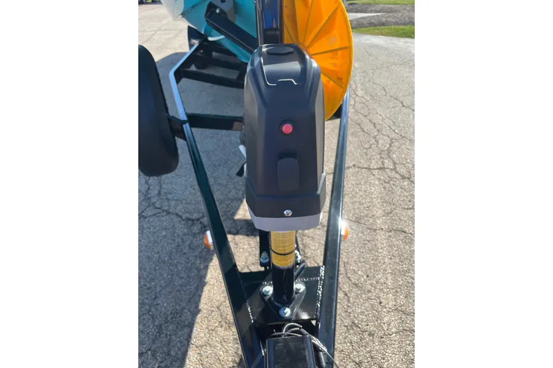 Slide: The Image of Trailer hitch of 2024 Regal LS9 Surf boat on pavement background. - 5