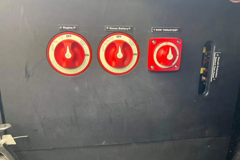 Slide: The Image of 2024 Regal LS9 Surf control panel with engine, battery, and bow thruster switches. - 8