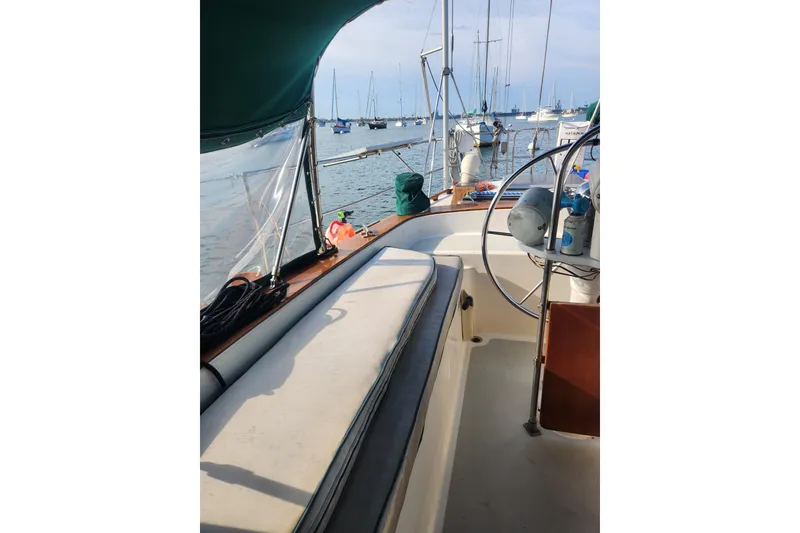 Slide: The Image of 1981 Guflstar Center Cockpit sailboat interior with marina view. - 24