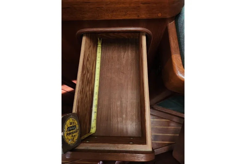 Slide: The Image of Wooden drawer with measuring tape inside, aboard 1981 Guflstar Center Cockpit boat. - 67