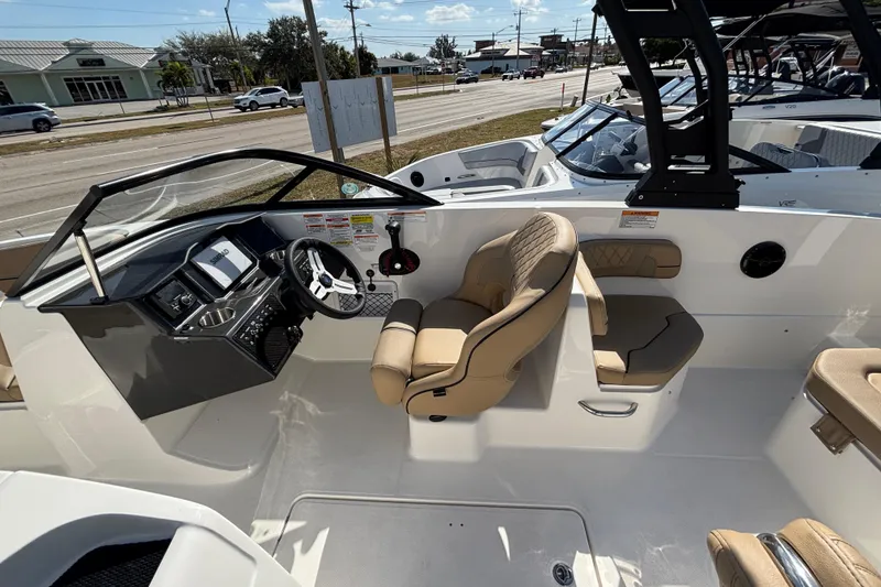 Slide: The Image of 2026 Bayliner VR6 Bowrider OB interior with modern dashboard and comfortable seating. - 20