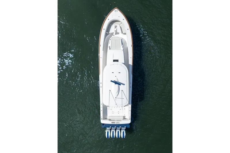 Slide: The Image of Aerial view of 2025 Valhalla Boatworks V-55 on water, showcasing sleek design. - 11