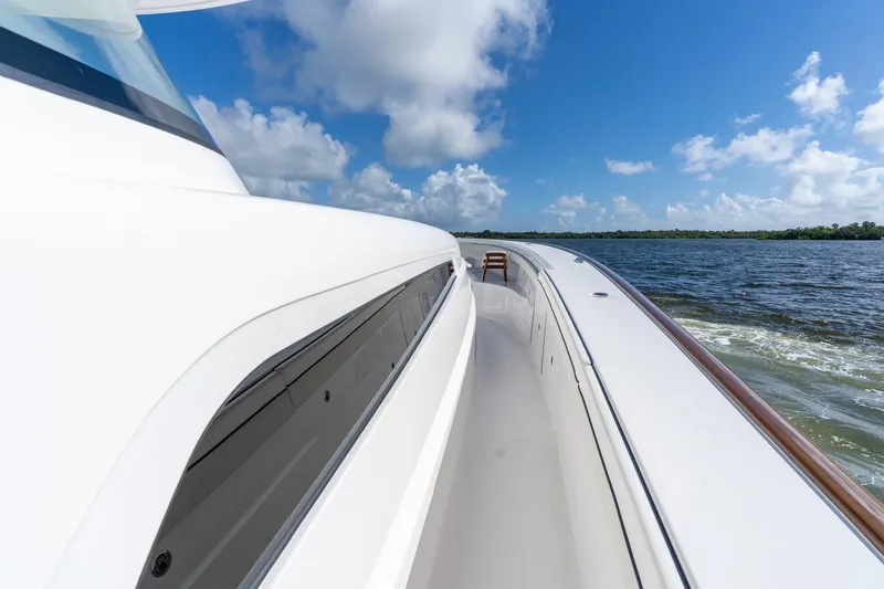 Slide: The Image of 2025 Valhalla Boatworks V-55 cruising on a sunny day, showcasing sleek design and craftsmanship. - 20