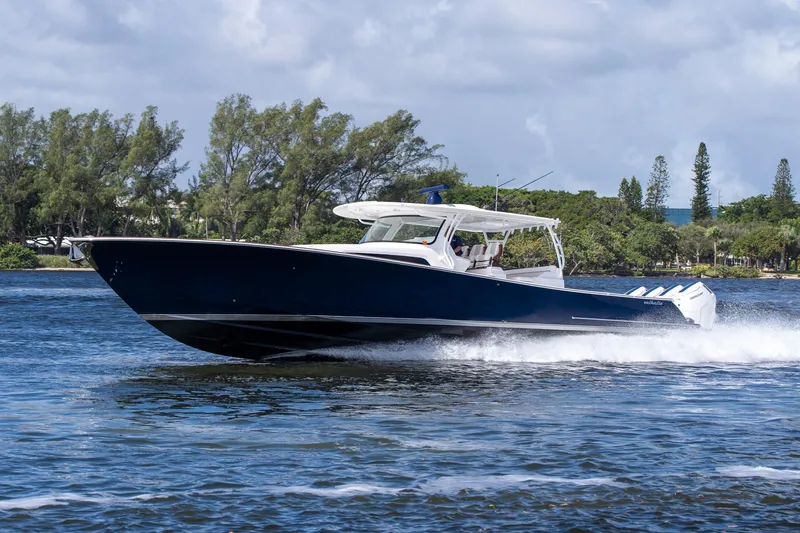 Slide: The Image of 2025 Valhalla Boatworks V-55 cruising on a scenic waterway. - 8