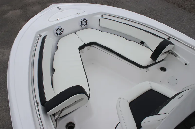 Slide: The Image of 2026 Tidewater 198 CC Adventure boat on trailer at Cove 2 Coast Marine dealership. - 15