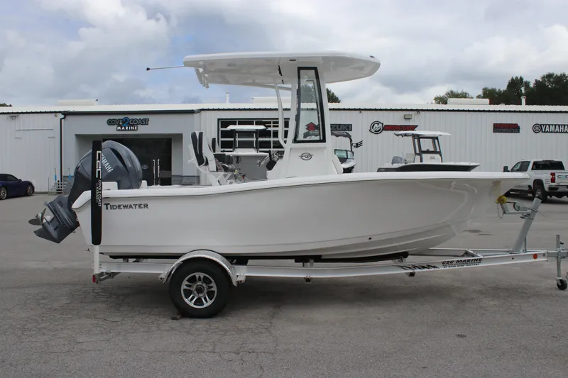 Slide: The Image of 2026 Tidewater 198 CC Adventure boat console with steering wheel and controls. - 5