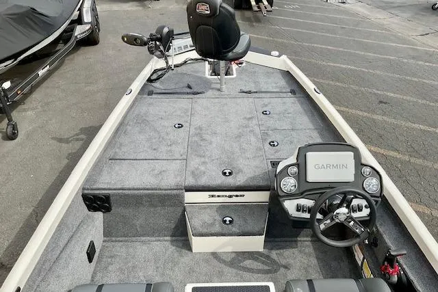 Slide: The Image of 2026 Ranger RT188P boat interior with Garmin navigation system and seating. - 2