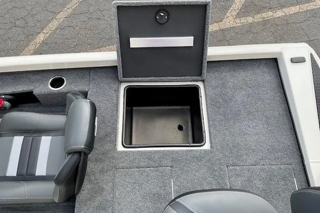 Slide: The Image of 2026 Ranger RT188P boat interior with open storage compartment and seating. - 8