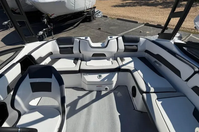 Slide: The Image of 2026 Yamaha Boats AR195 interior with sleek seating and modern design. - 11