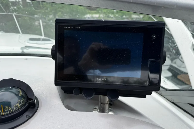 Slide: The Image of Garmin GPSMAP 7608 on 2007 Rinker 300 Fiesta Vee boat dashboard. - 16